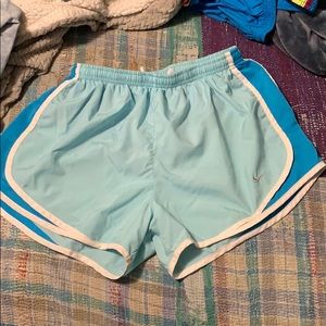 Light blue nike running shorts